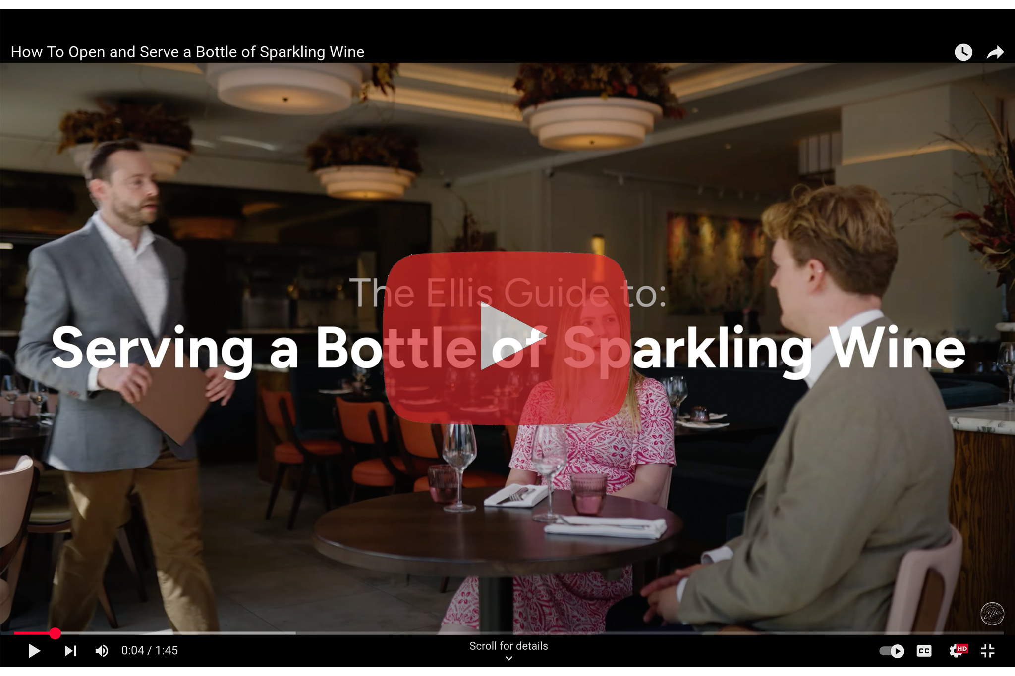 YouTube video still - Jonny serving wine