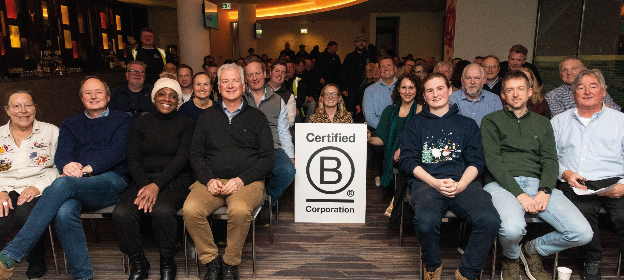 Ellis team with B Corp banner