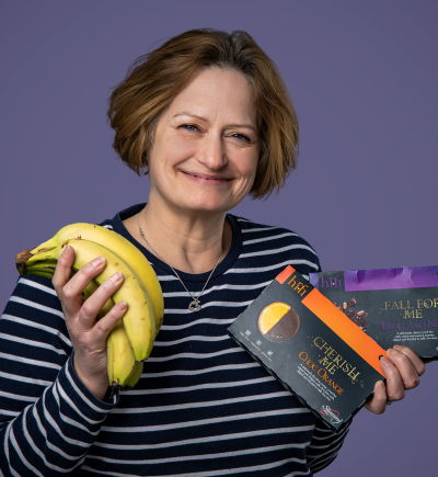 Mandy holding bananas and chocolate